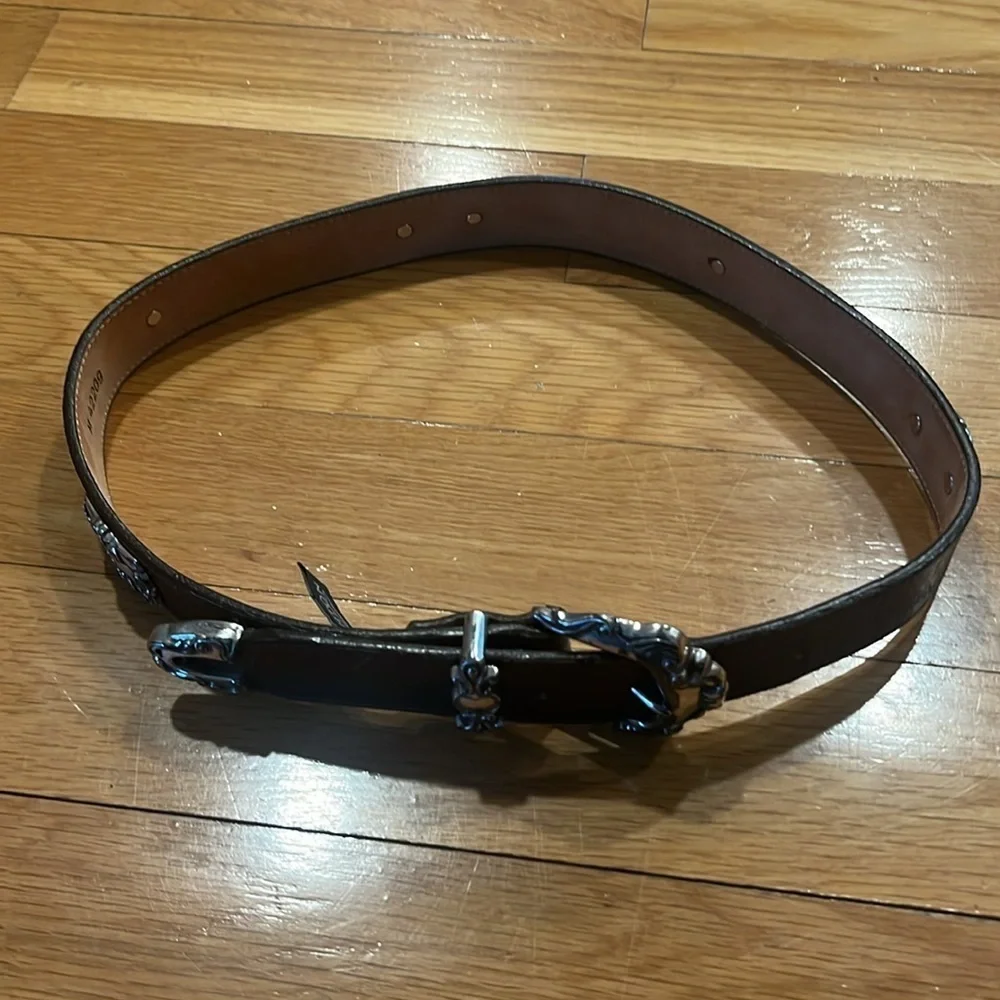 Brighton 1993 dark brown textured silver medallion accents belt size medium.